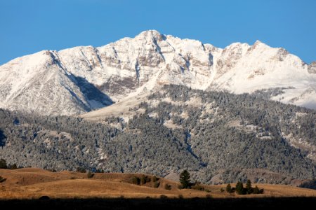 Fresh snow on Electric Peak in the fall photo