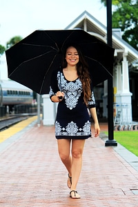 Rain walking female photo