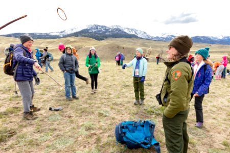 Expedition Yellowstone group playing "Ring the Stick," a Kootenai game