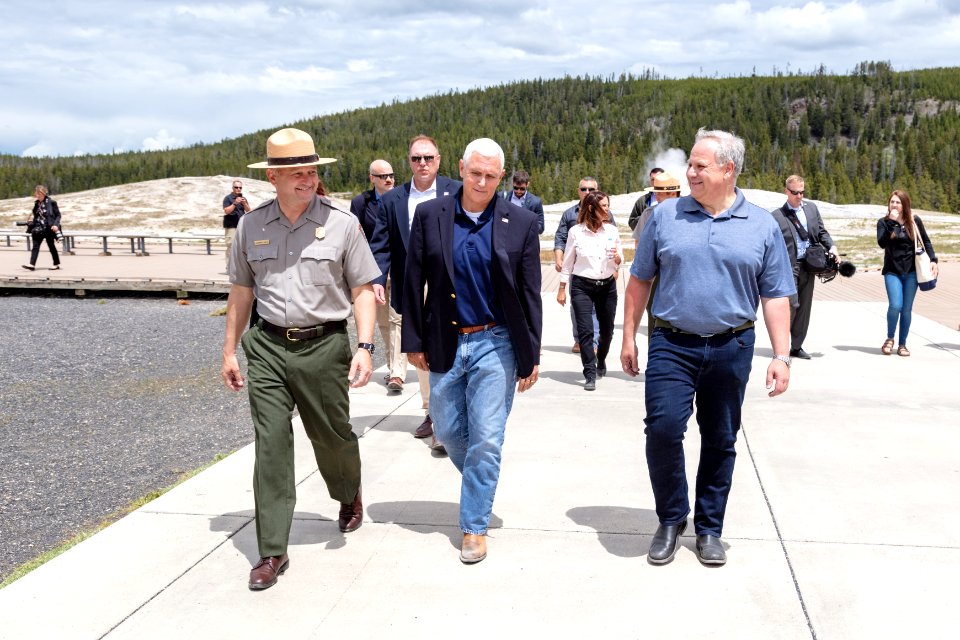 Superintendent Cam Sholly walks with Vice President Mike Pence and Secretary of the Interior David Bernhardt at Old Faithful