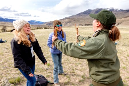 Expedition Yellowstone group playing "Guessing Sticks," a Chippewa game (2) photo