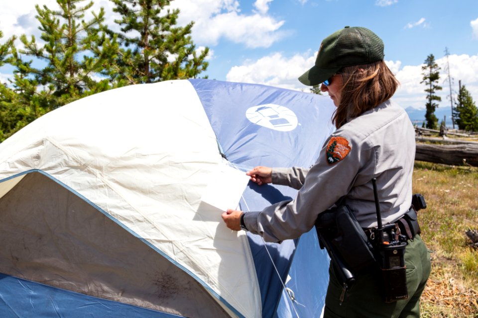 Ranger Sene inspects a backcountry permit