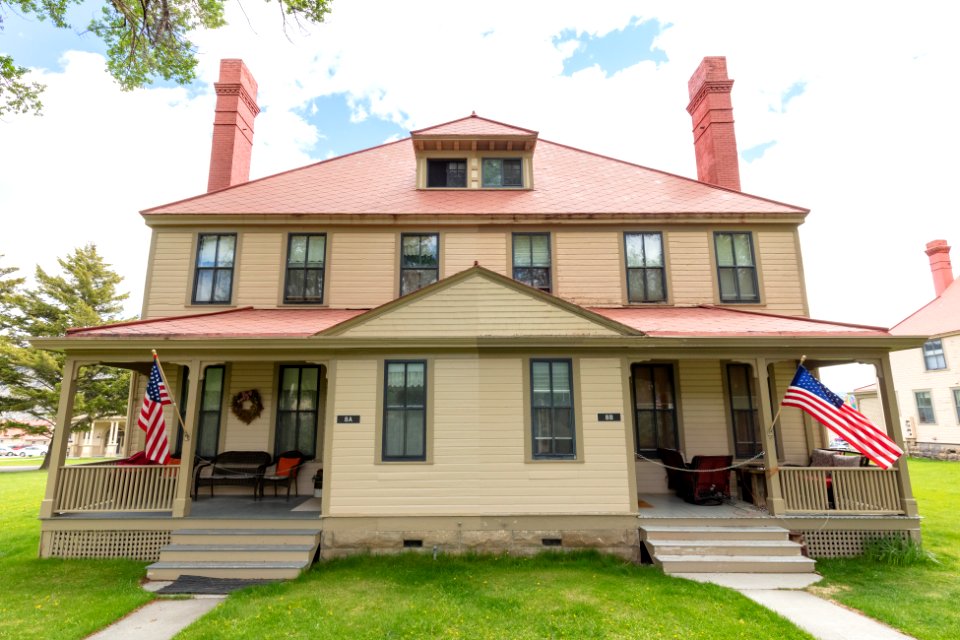 Historic housing exterior comparisons: fresh paint (left side) and old paint (right side)