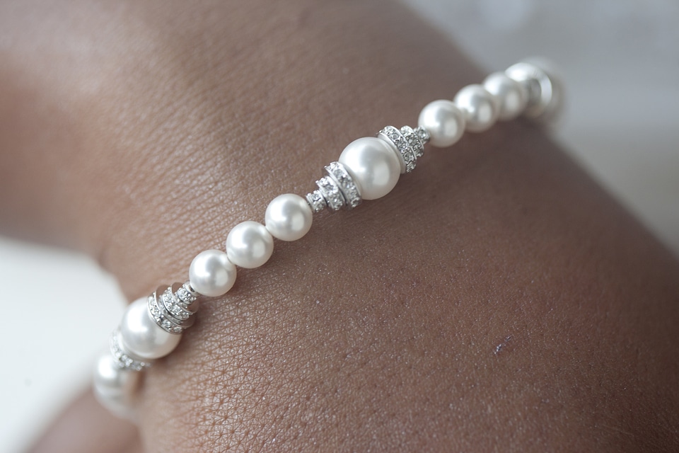 White bracelet woman