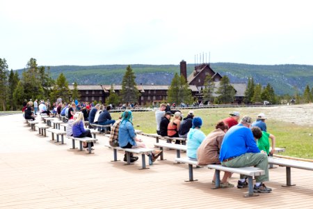Visitors waiting for an Old Faithful eruption on Opening Day 2020 photo