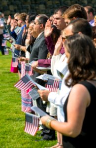 Applicants take the Oath of Allegiance at a naturalization ceremony