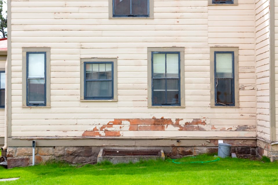 Historic housing exterior comparisons: old paint detailed side view