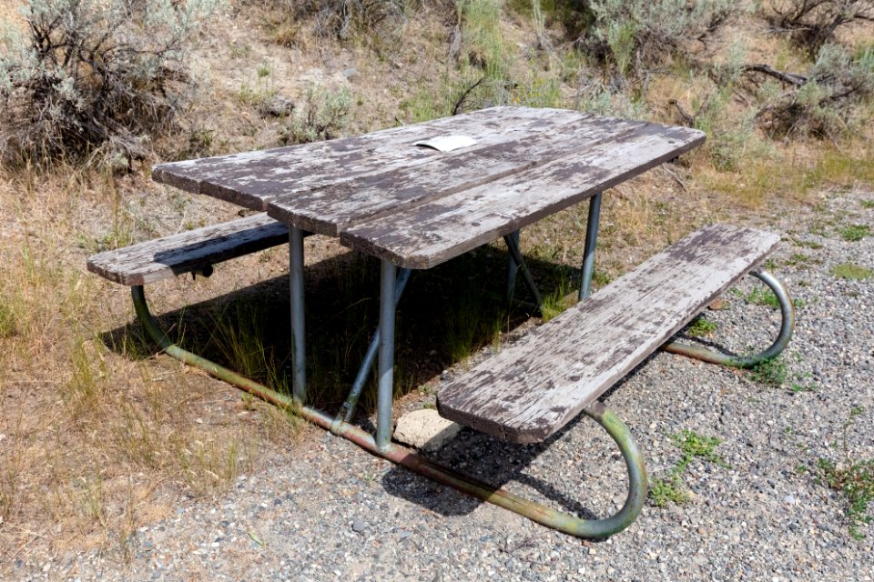 Old picnic benches in campgrounds