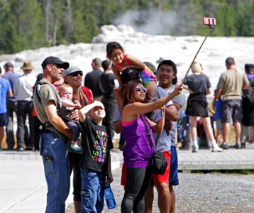 Taking a selfie at Old Faithful photo