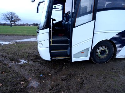 Please wipe your feet before getting on the coach.