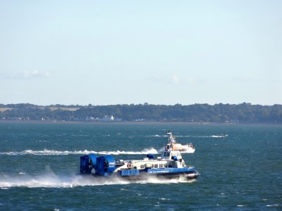 HOVERCRAFT FLYING PAST THE PILOT BOAT photo