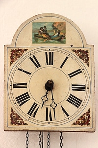 Pendulum clock time pointer photo