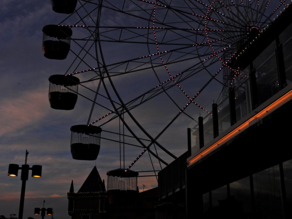 I sat there alone upon the ferris wheel