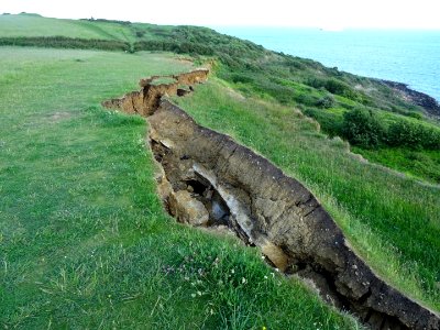 SOUTH WEST COASTAL PATH FALLING INTO THE SEA.