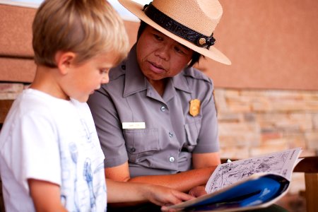 Diane Tom talks with a junior ranger.