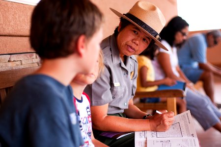 Diane Tom talks with a junior ranger.