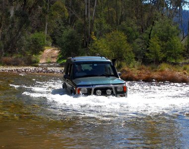 Land Rover crossing the Swampy Plains River - NSW Snowy Mountains photo