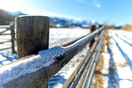 snow covered ranch fencing photo