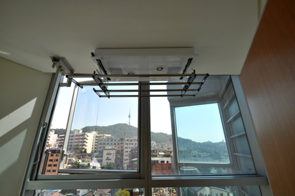 Korean Fire Escape (left) and retractable drying rack (center)