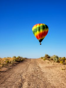 hot air balloon preparing to land in Rio Rancho
