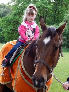 Child girl ride