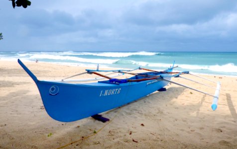 The blue fishing boat.