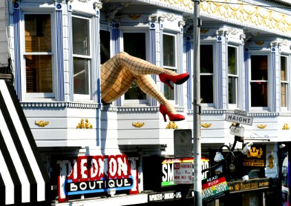 San Francisco.  Legs Hanging Out The Window.