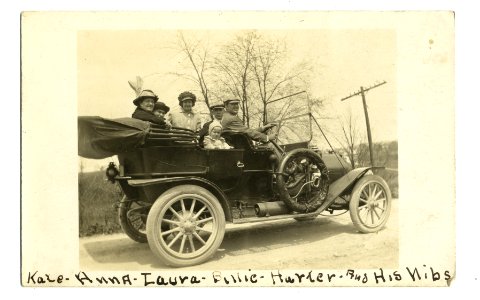 Family in a 1910 EMF 30 Touring car. photo