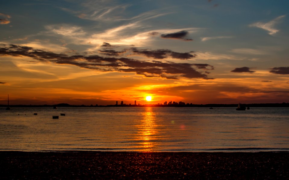 Sunset behind Boston from Peddocks Island