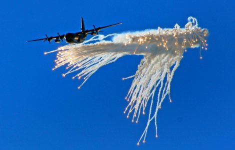 Lockheed C-130 Hercules Dropping flares. photo