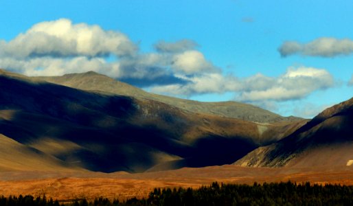 Sunset on the far hills.. photo