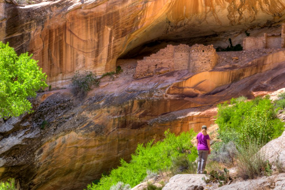 Person assessing cave mouth
