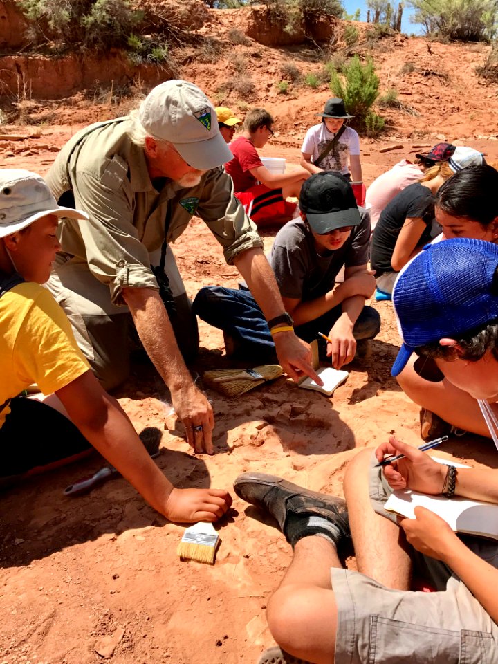 BLM Regional Paleontologist Dr. Brent Breithaupt showed campers how to document the Mail Station track site near Moab