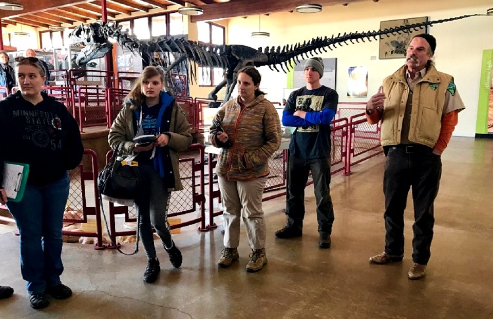 Geologist Mike Leschin describes the Jurassic mystery to the South Dakota School of Mining and Technology students. CLDQ, UT. Photo by BLM-UT