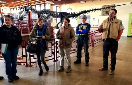 Geologist Mike Leschin describes the Jurassic mystery to the South Dakota School of Mining and Technology students. CLDQ, UT. Photo by BLM-UT