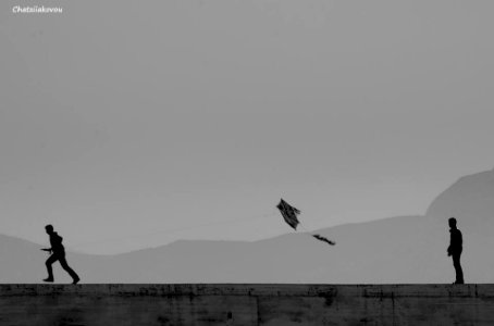Flying a kite in Ormos Marathokampos