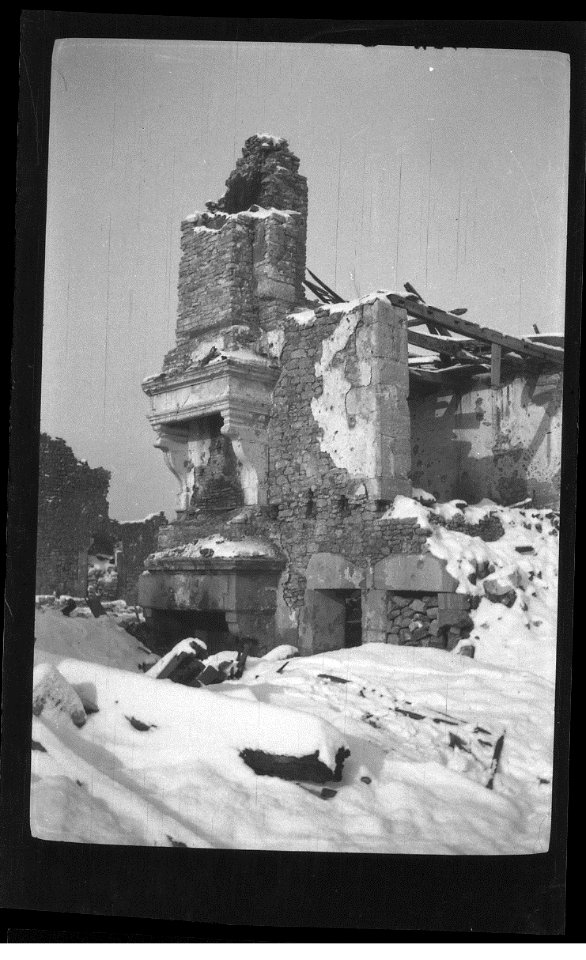 remains of a chinmey with snow