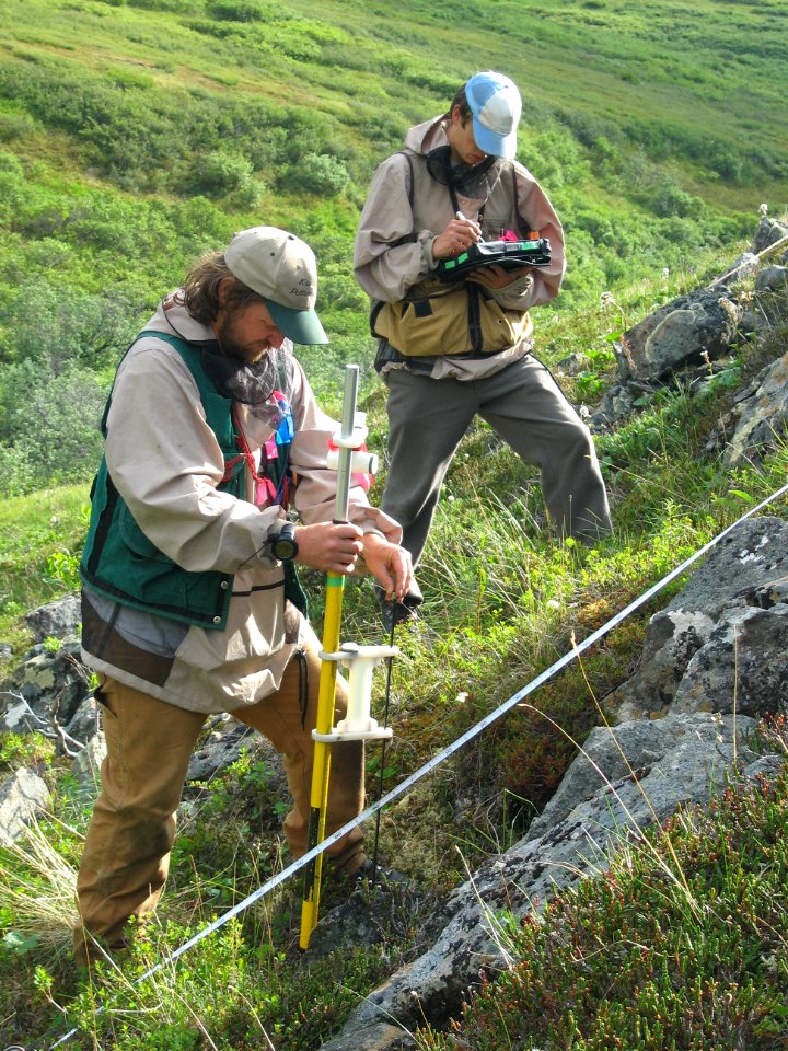 Carl Roland and Peter Nelson collect plant cover data near Kankone Peak in the Kantishna Hills in 2006.