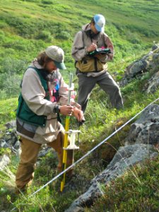 Carl Roland and Peter Nelson collect plant cover data near Kankone Peak in the Kantishna Hills in 2006.