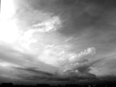Clouds in black photo