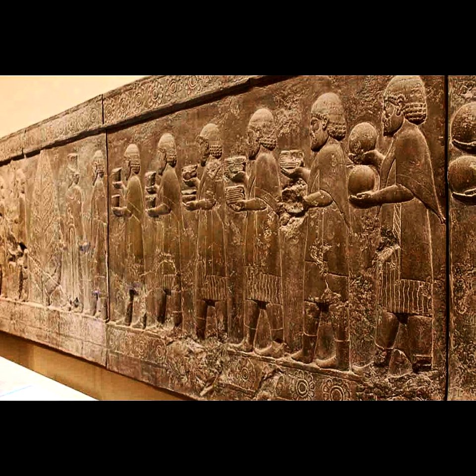 Modern cast taken from sculptures on the Apadana at Perseopolis, Iran  Ionia was one of the westernmost provinces of the Persian Empire and included the nearby Greek islands. The bareheaded men are shown wearing fringed cloaks, and carry different types o