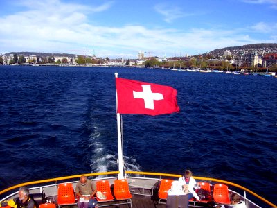 Zurich, Switzerland, Lake Excursion with Swiss Flag photo
