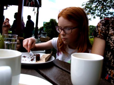 Zoe is preparing to eat cake