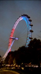 The London Eye in Blue, White, and Red photo