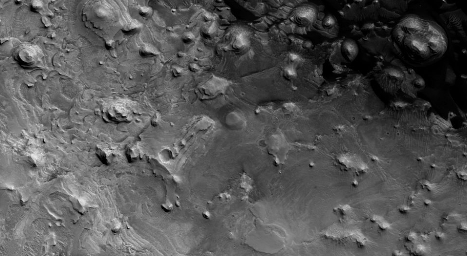 Layered Deposits in a Crater in Western Arabia Terra