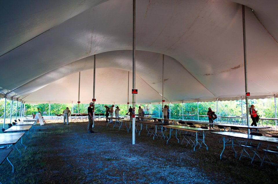 Setting up inside the big tent at the 2016 Swamp Heritage Festival