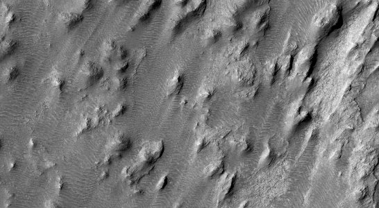 Pitted Material on a Crater Floor photo