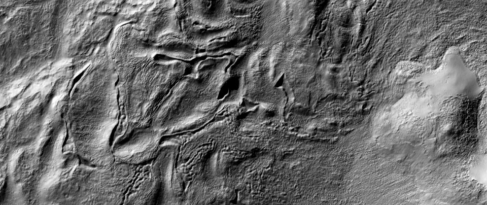 Ridges and Troughs in a Crater Northeast of Eudoxus Crater