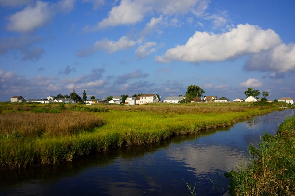 Marshland clouds reflection photo