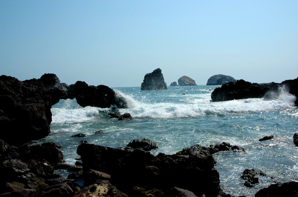 Spray at the little arch rock, waves, islands, Pacific Ocean, South Mazatlan, Mexico